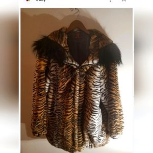 Adrienne Landu tiger stripe coat.